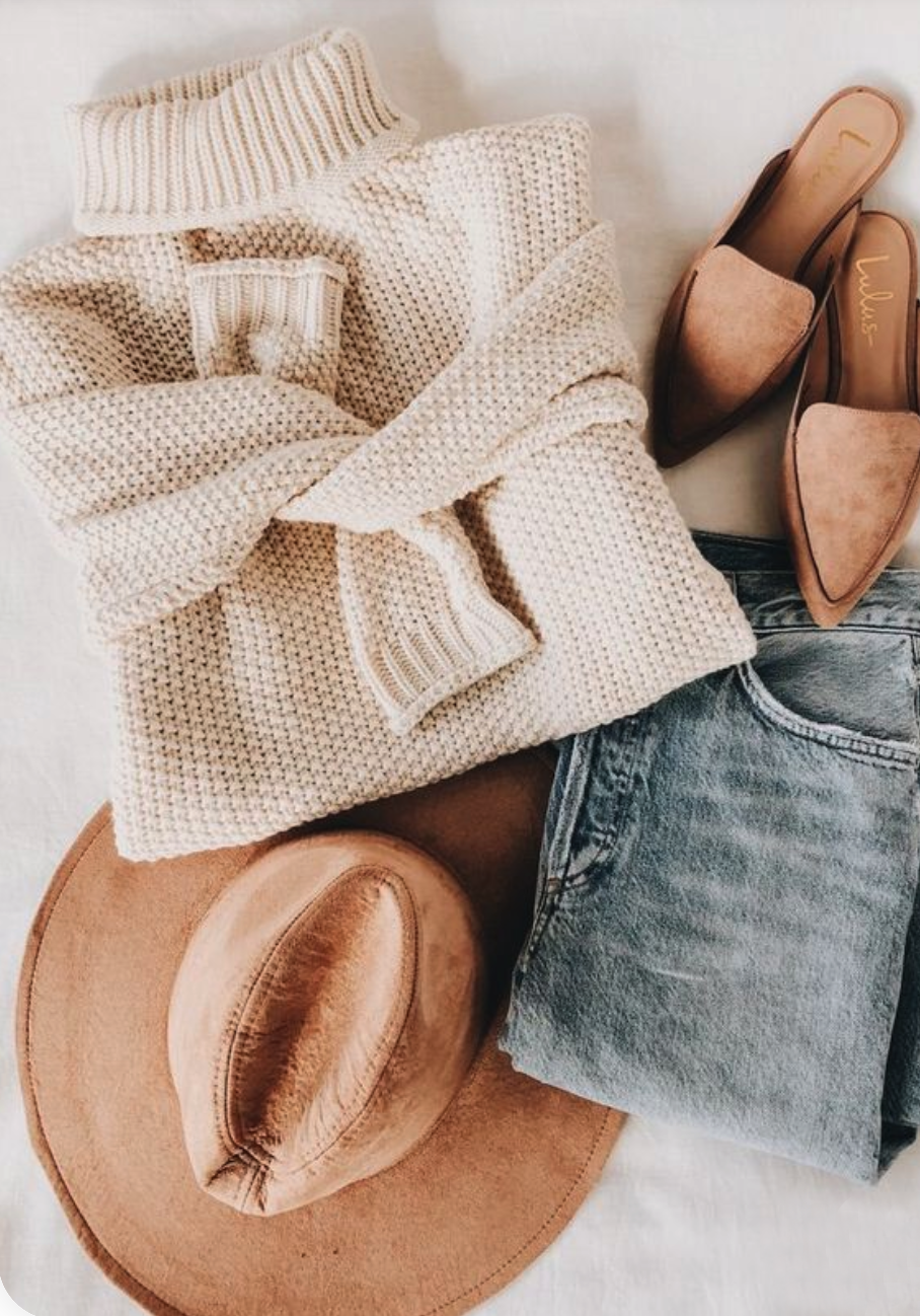 Creamy turtleneck knit
                    sweater
                    with light wash jeans and light brown fedora