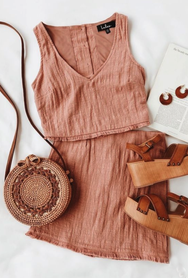 Two piece light
                    salmon shirt
                    and skirt